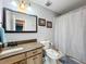 Bathroom with granite countertop and shower/tub combo at 2720 Ewell Rd, Lakeland, FL 33811