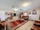 Relaxing living room with leather furniture and a large area rug at 2720 Ewell Rd, Lakeland, FL 33811