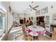 Sunroom dining area with access to kitchen and patio at 2720 Ewell Rd, Lakeland, FL 33811