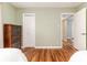 Light-filled bedroom with hardwood floors and ample closet space at 2729 Woodland Hills Ave, Lakeland, FL 33803