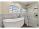 Modern bathroom with soaking tub and walk-in shower at 2774 Verandah Vue Way, Lakeland, FL 33812