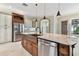 Kitchen island with copper farm sink and dishwasher at 2774 Verandah Vue Way, Lakeland, FL 33812