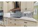 Kitchen with copper range hood and stylish backsplash at 2774 Verandah Vue Way, Lakeland, FL 33812