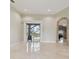 Living area showcasing access to pool and kitchen at 2774 Verandah Vue Way, Lakeland, FL 33812