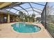 Resort-style pool and spa with screened enclosure at 2774 Verandah Vue Way, Lakeland, FL 33812