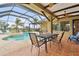 Inviting screened pool and spa with outdoor patio furniture at 2774 Verandah Vue Way, Lakeland, FL 33812