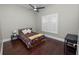 Bright bedroom with wood floors and a window with shutters at 2961 Sanctuary Cir, Lakeland, FL 33803