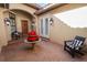 Brick paved courtyard with fountain and comfortable seating at 2961 Sanctuary Cir, Lakeland, FL 33803