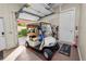 Garage with golf cart and storage space at 2961 Sanctuary Cir, Lakeland, FL 33803