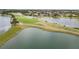 Golf course with lake and walking path at 2961 Sanctuary Cir, Lakeland, FL 33803