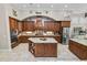 Bright kitchen with granite countertops and large island at 2961 Sanctuary Cir, Lakeland, FL 33803