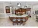 Island kitchen with granite countertops and breakfast bar at 2961 Sanctuary Cir, Lakeland, FL 33803