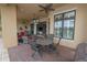 Outdoor patio with seating, fire pit, and pool view at 2961 Sanctuary Cir, Lakeland, FL 33803