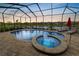 Serene pool and spa at sunset at 2961 Sanctuary Cir, Lakeland, FL 33803