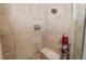 Large walk-in shower with tiled walls and built-in seat at 2961 Sanctuary Cir, Lakeland, FL 33803