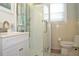 Clean bathroom with shower and updated vanity at 306 Avenue C Ne, Winter Haven, FL 33881