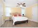 Spacious bedroom with neutral decor and new flooring at 306 Avenue C Ne, Winter Haven, FL 33881