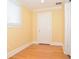 Small bedroom with bamboo flooring and a closet at 306 Avenue C Ne, Winter Haven, FL 33881