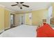 Bright bedroom with hardwood floors and large windows at 306 Avenue C Ne, Winter Haven, FL 33881