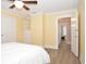 Spacious bedroom with built-in shelving and hardwood floors at 306 Avenue C Ne, Winter Haven, FL 33881