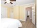 Spacious bedroom with built-in shelving and hardwood floors at 306 Avenue C Ne, Winter Haven, FL 33881