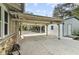 Covered carport with concrete flooring at 306 Avenue C Ne, Winter Haven, FL 33881