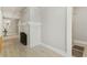 Classic fireplace with a tiled surround in a hallway at 306 Avenue C Ne, Winter Haven, FL 33881