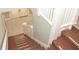 View of the staircase leading to the upper level of the home at 306 Avenue C Ne, Winter Haven, FL 33881