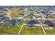 Aerial view of houses with pools and backyard at 3098 Pearly Dr, Lakeland, FL 33812