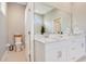 Bathroom with double vanity and marble countertop at 3098 Pearly Dr, Lakeland, FL 33812