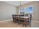 Farmhouse-style dining room featuring a wooden table and black chairs at 3098 Pearly Dr, Lakeland, FL 33812