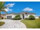 House exterior with gray garage door and stone accents at 3098 Pearly Dr, Lakeland, FL 33812