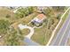 Home's bird's-eye view showing landscaping and yard at 3220 Clubhouse Rd, Lakeland, FL 33812