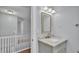 Small bathroom with vanity and a mirror at 3220 Clubhouse Rd, Lakeland, FL 33812