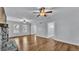 Spacious living room with hardwood floors and ceiling fan at 3220 Clubhouse Rd, Lakeland, FL 33812