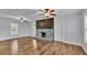 Living room with fireplace and hardwood floors at 3220 Clubhouse Rd, Lakeland, FL 33812