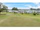 Community view showing home near golf course at 3221 Pebble Bend Dr, Lakeland, FL 33810