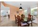 Dining room with a dark wood table and built-in hutch at 3221 Pebble Bend Dr, Lakeland, FL 33810