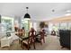 Bright dining room with a built-in hutch and a wooden table at 3221 Pebble Bend Dr, Lakeland, FL 33810