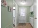 Bright entryway with built-in storage and coat closet at 3221 Pebble Bend Dr, Lakeland, FL 33810