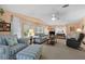 Bright living room featuring two sofas and a coffee table at 3221 Pebble Bend Dr, Lakeland, FL 33810