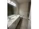 Clean bathroom with double vanity, bathtub and tile flooring at 357 Siesta Vista Ct, Davenport, FL 33896