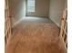 Large bedroom with double doors and carpeted floors at 357 Siesta Vista Ct, Davenport, FL 33896