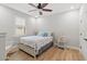 Cozy bedroom with a queen-size bed and rocking chair at 3604 Frentress Dr, Lakeland, FL 33812