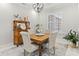 Charming dining room with antique buffet and a four-person table at 3604 Frentress Dr, Lakeland, FL 33812