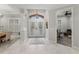 Bright and airy entryway with elegant double doors and tile flooring at 3604 Frentress Dr, Lakeland, FL 33812