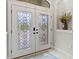 Elegant entryway with double doors and stained glass at 3604 Frentress Dr, Lakeland, FL 33812