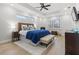 Large main bedroom with a comfortable king bed, neutral decor, and wood floors at 3604 Frentress Dr, Lakeland, FL 33812