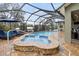 Screened pool and spa with patio furniture at 3604 Frentress Dr, Lakeland, FL 33812