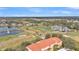 Aerial view of community, golf course, and clubhouse at 362 Enclave Dr, Lakeland, FL 33803